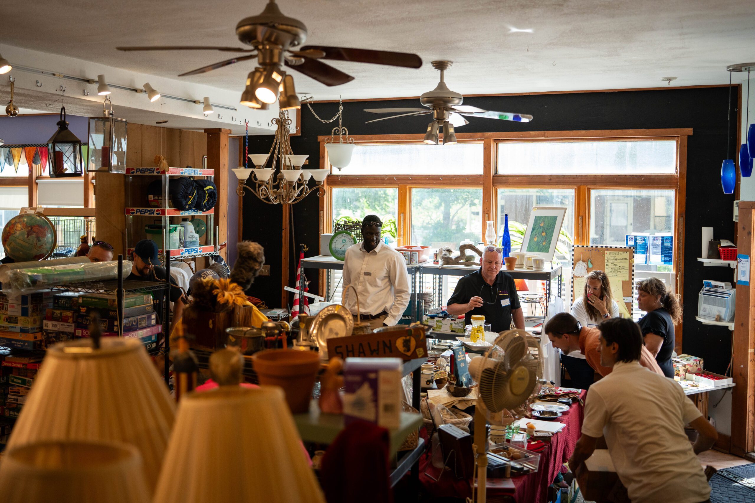 Estate sale collectibles and kitchenware on display at Simple Treasures