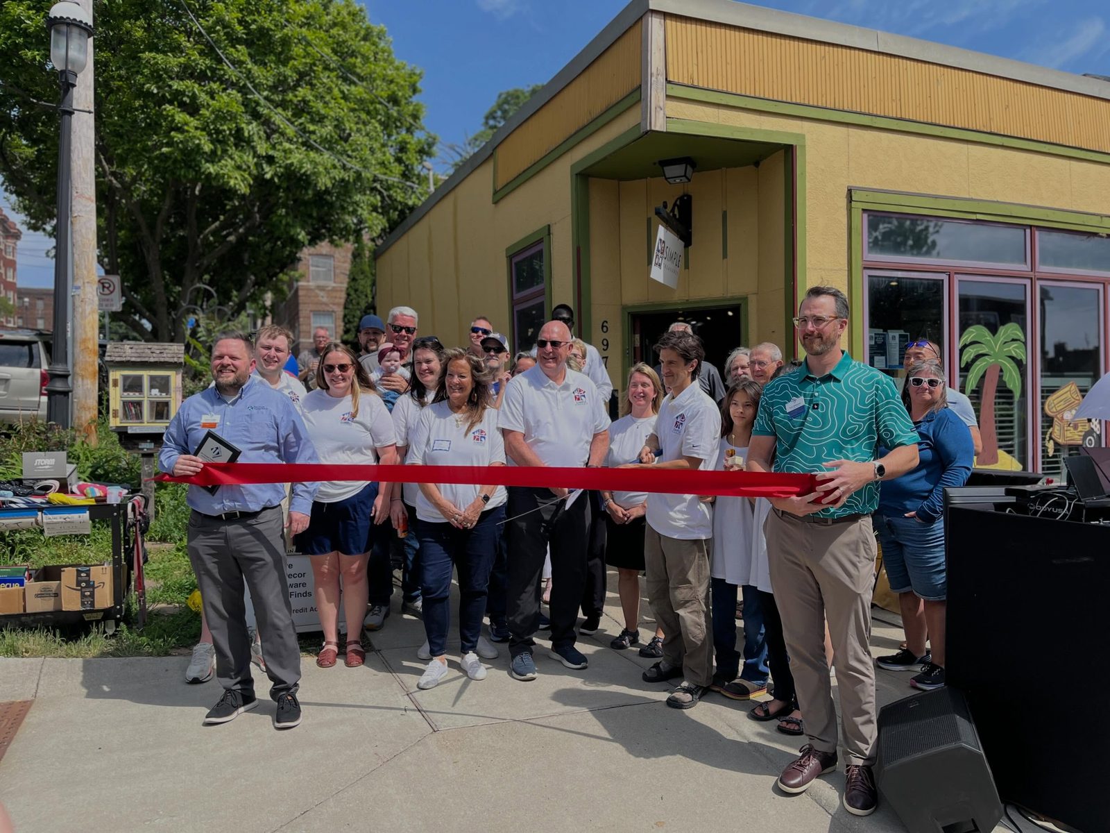 Ribbon cutting at the Simple Treasures grand opening in Sherman Hill, Des Moines